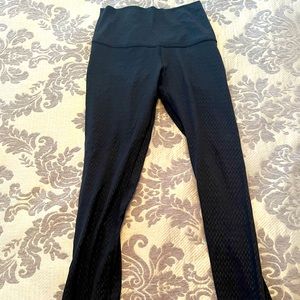 Black embossed align leggings. Size 4. 23 inches long
